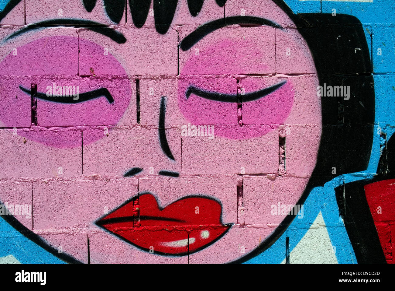 Graffiti portrait on a wall in Nerja, Andalusia, Spain Stock Photo