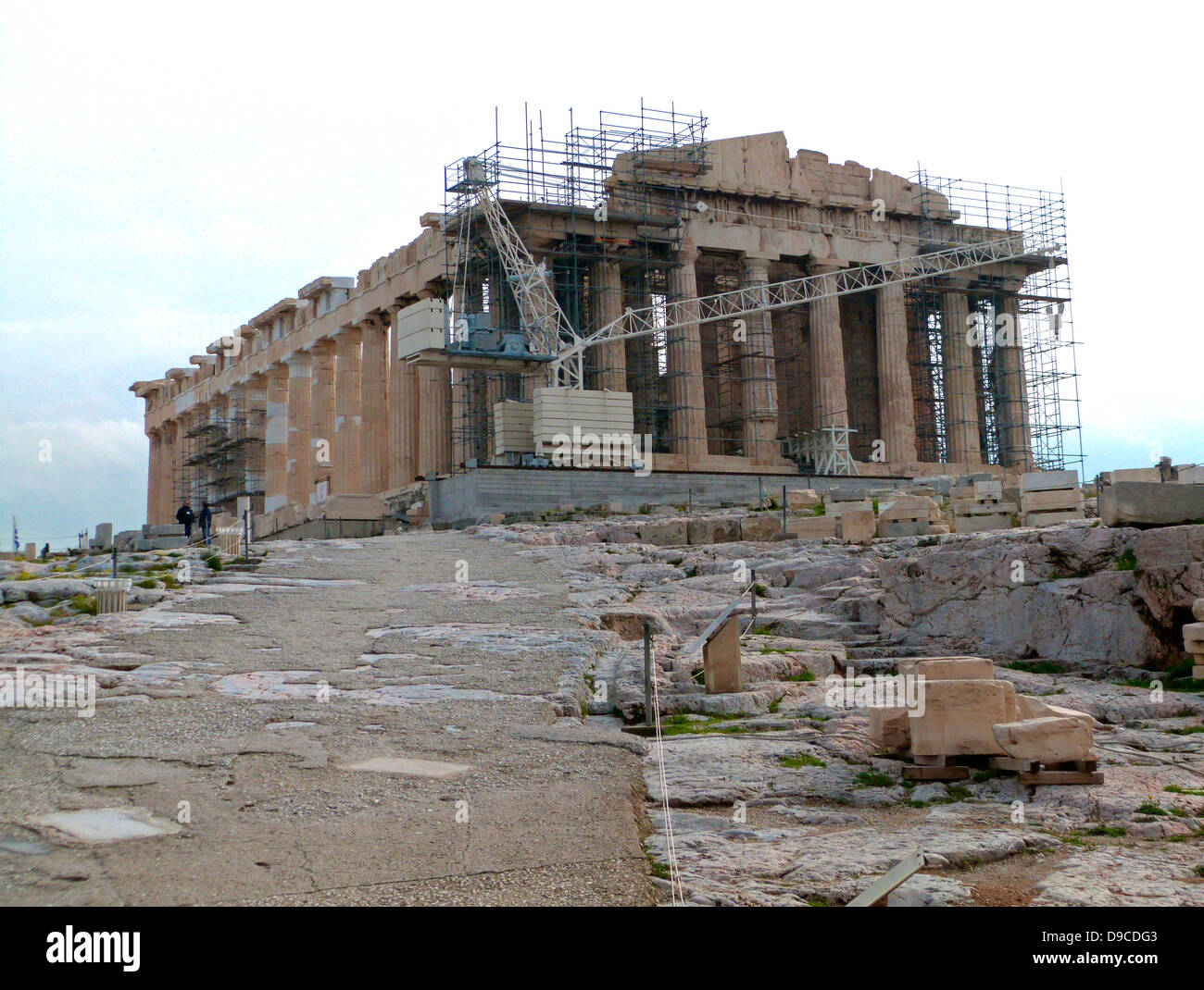 The Parthenon temple on the Athenian Acropolis, Greece, dedicated to the Greek goddess Athena, whom the people of Athens considered their virgin patron. Its construction began in 447 BC when the Athenian Empire was at the height of its power. It was completed in 438 BC, although decoration of the Parthenon continued until 432 BC. It is the most important surviving building of Classical Greece, Stock Photo