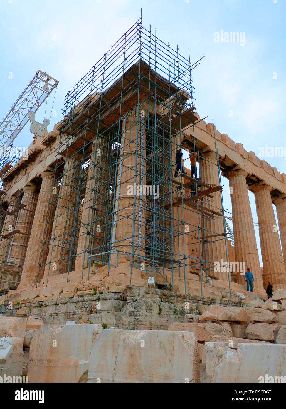 The Parthenon temple on the Athenian Acropolis, Greece, dedicated to the Greek goddess Athena, whom the people of Athens considered their virgin patron. Its construction began in 447 BC when the Athenian Empire was at the height of its power. It was completed in 438 BC, although decoration of the Parthenon continued until 432 BC. It is the most important surviving building of Classical Greece, Stock Photo