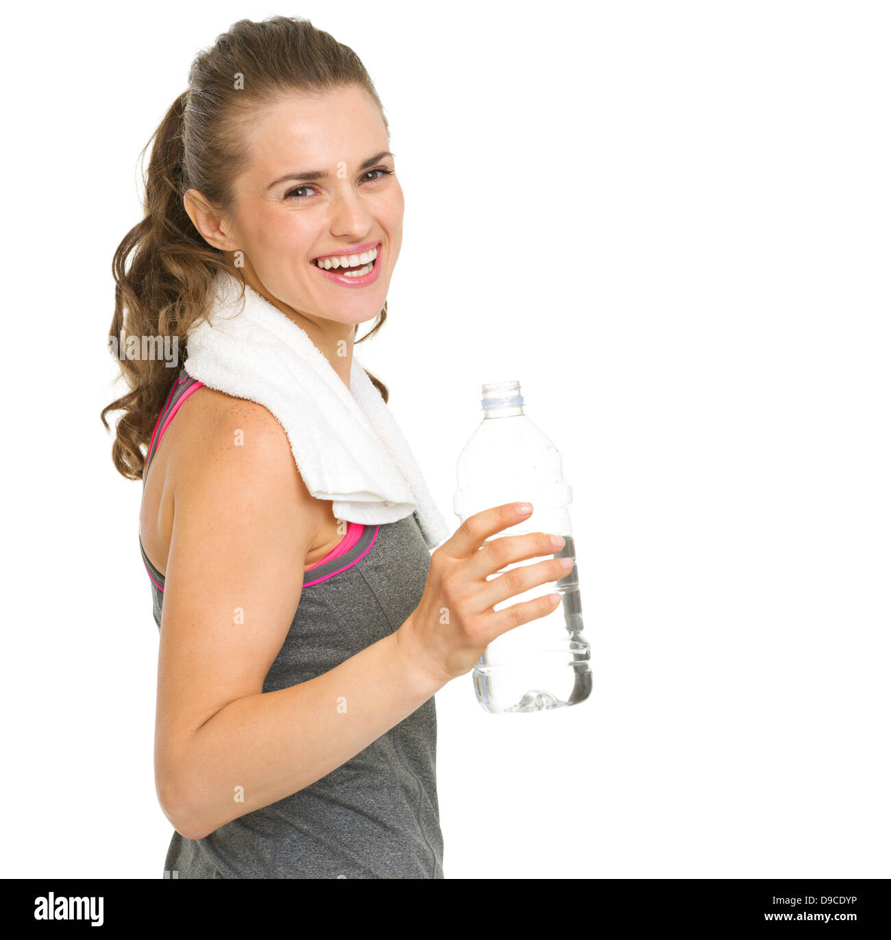 Portrait of happy fitness young woman with bottle of water Stock Photo ...