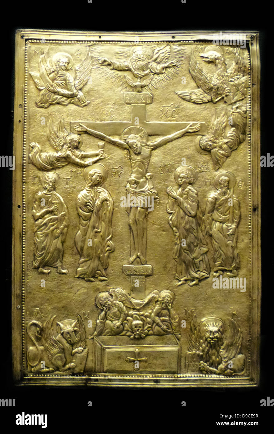 Cover of a gospel book with a representation of the Crucifixion. A work showing influences of central European prototypes, likely to have been made in Wallachia or Transylvania by Goldsmith Nicholaos Vranianit, 1548. Stock Photo