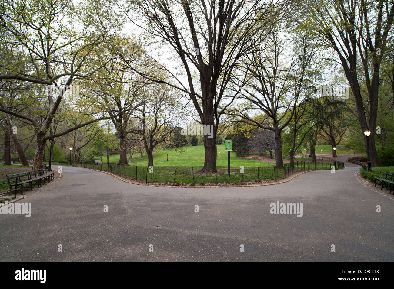 View of the pathways around Cedar Hill in New York City's Central Park. Stock Photo
