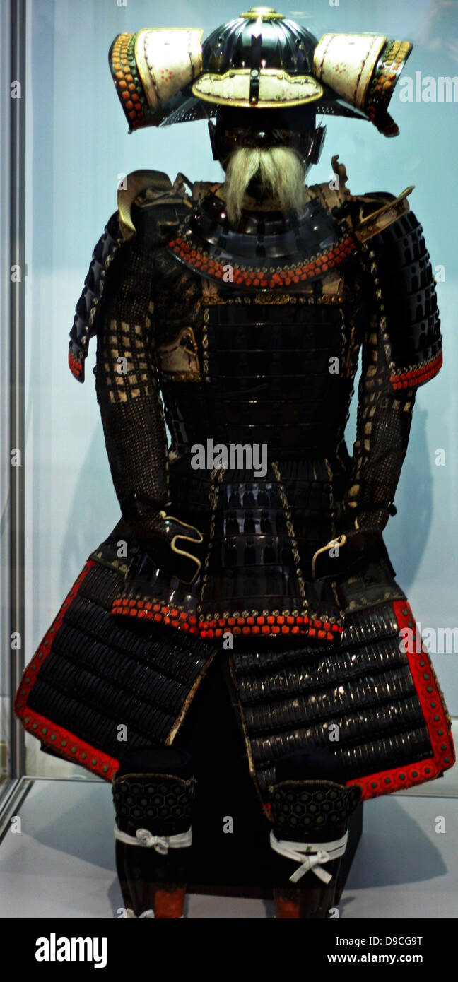 Samurai suit mid 18th century. Armour in Japan has a history that goes back as far as the 4th century.[1] Japanese armour developed enormously over the centuries since its introduction to the battlefield. It was worn to varying degrees by numerous classes; most notably by the samurai (and by default the ashigaru), and was seen on the battlefield both on mounted and foot troops. Stock Photo