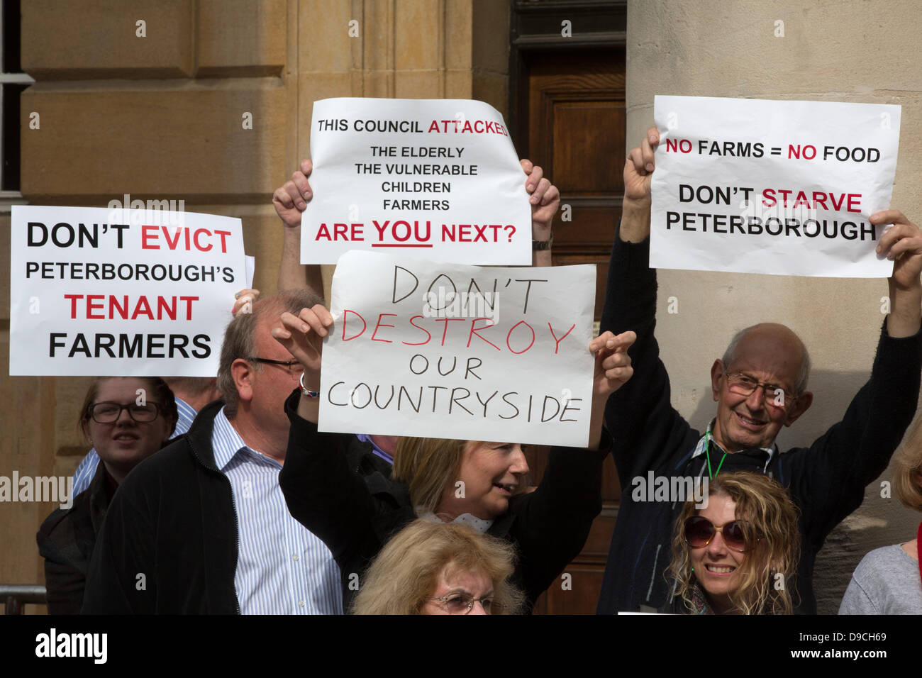 Peterborough,Cambridgeshire, UK. 17th June, 2013.  Protesters gathered  outside Peterborough Town Hall to protest about plans for an energy park on prime farmland near Peterborough.The Morris fen project near Thorney would involve 144,060 solar panels on the 100 hectare site. Picture Tim Scrivener/Alamy Live News Stock Photo