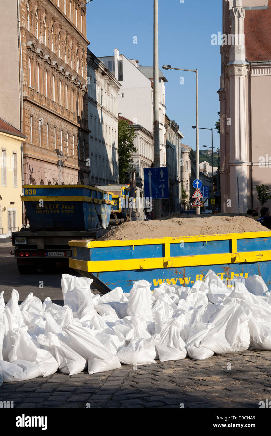 A skip of sand and sandbags ready to protect buildings from the flooding River Danube, Budapest, Hungary Stock Photo