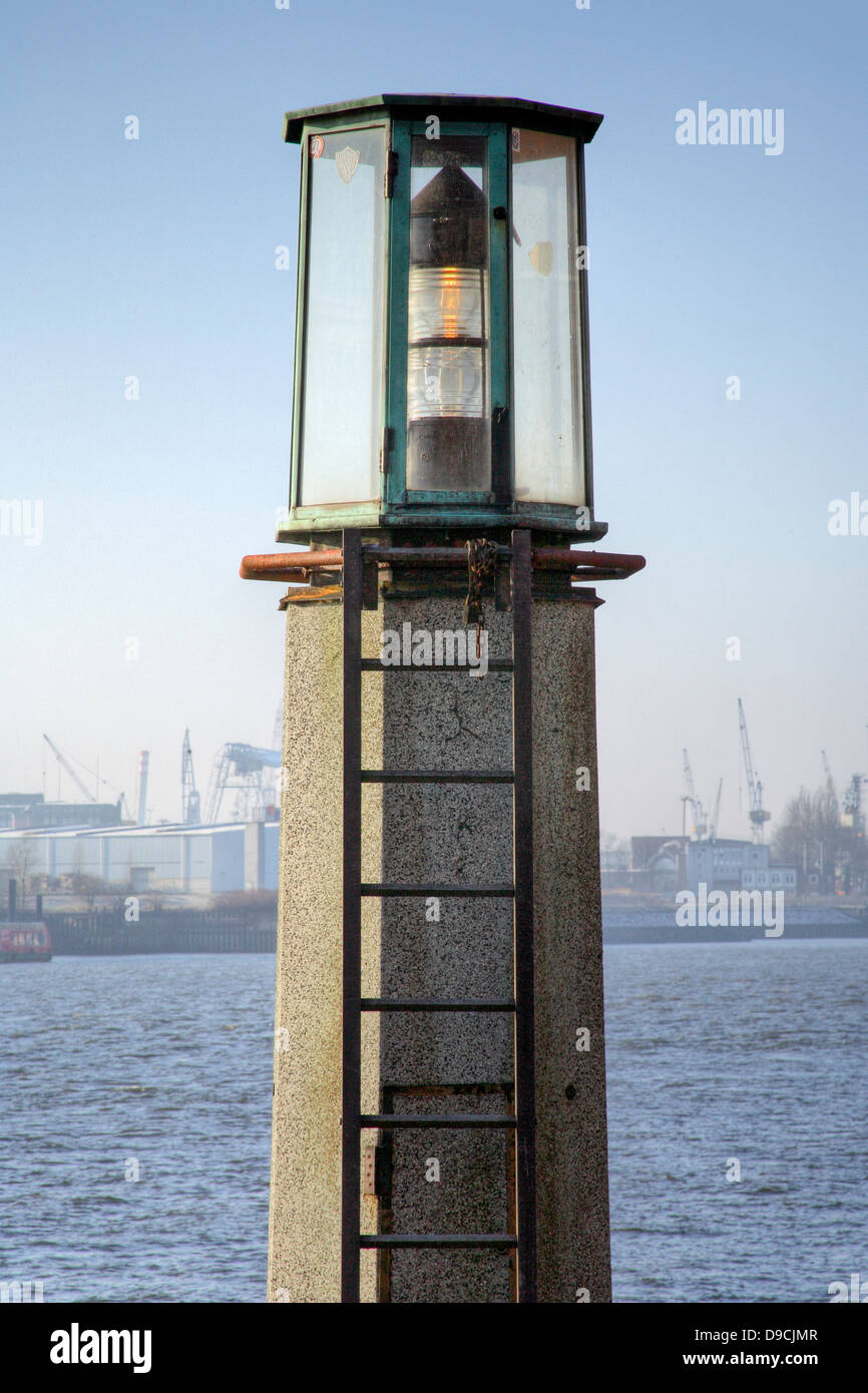 Old beacon in the Hamburg harbour (harbour city) Stock Photo