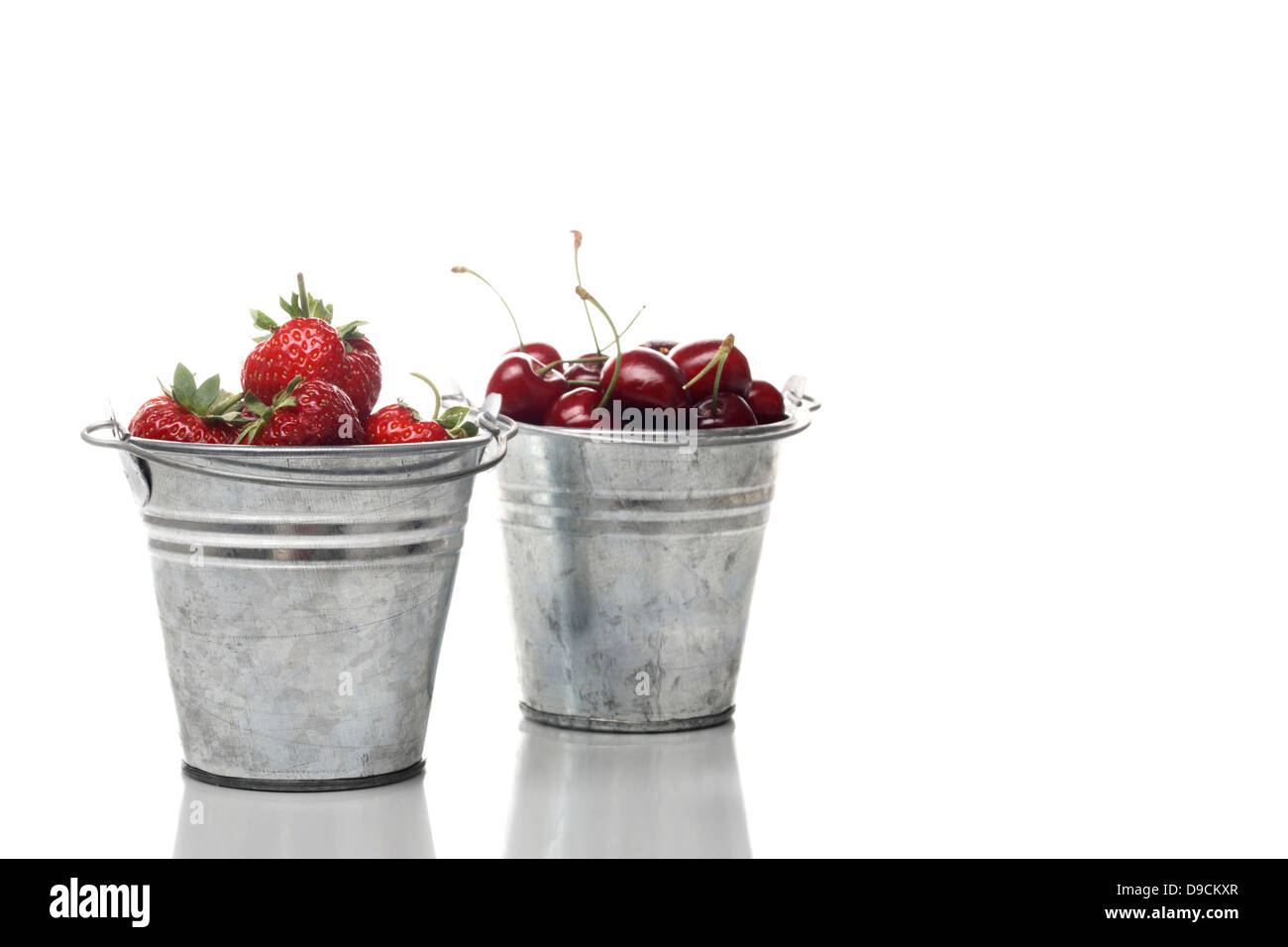 Bucket with strawberries and cherries Stock Photo - Alamy