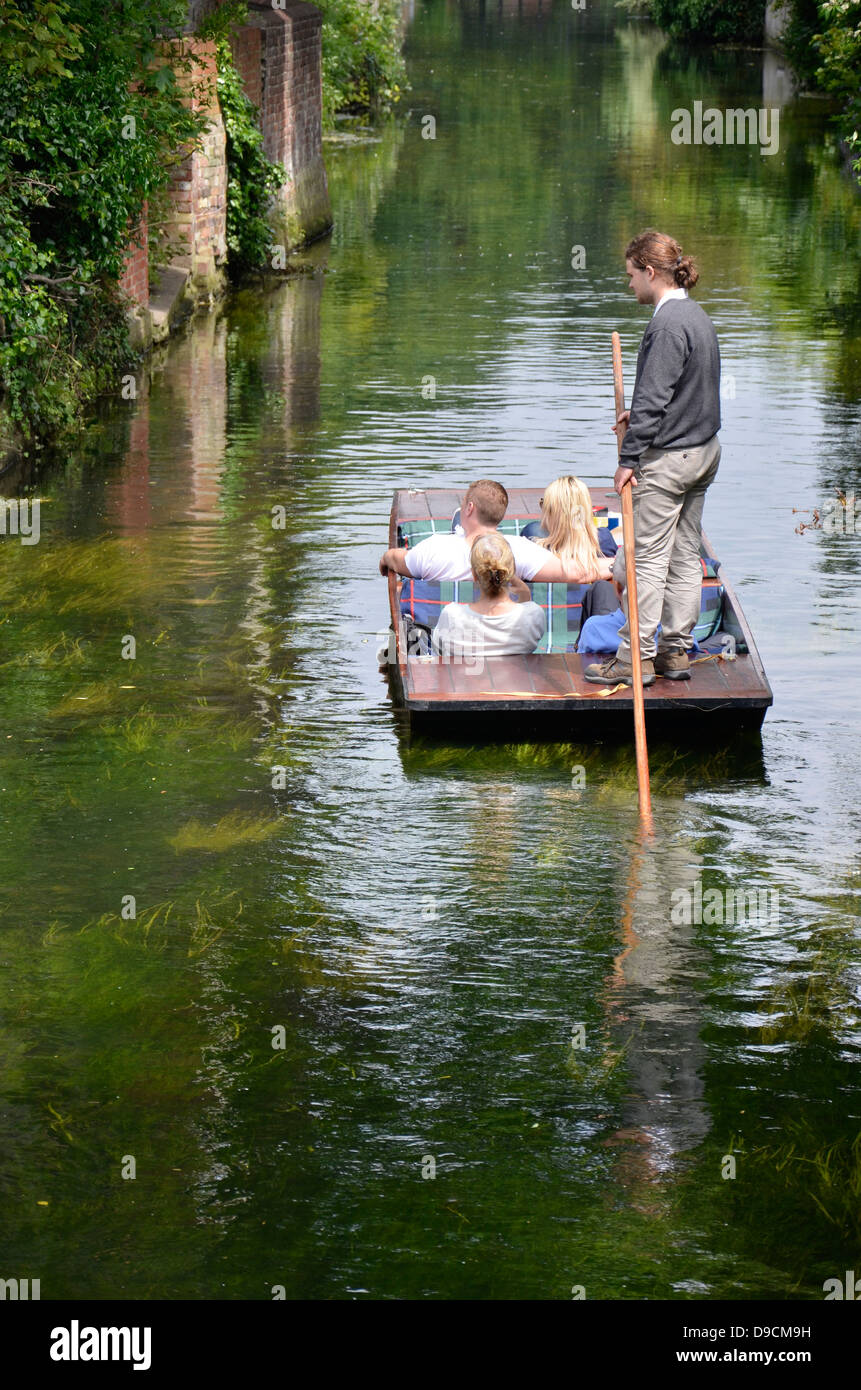 A group of young people enjoy a boat ride, a leisure activity ...