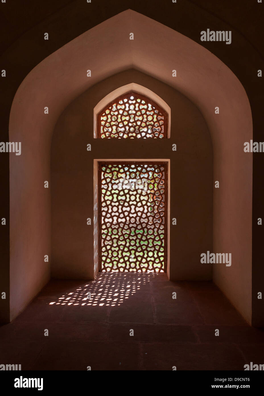 Alcove with stone screen in window at the Humayun tomb in New Delhi, India. Stock Photo