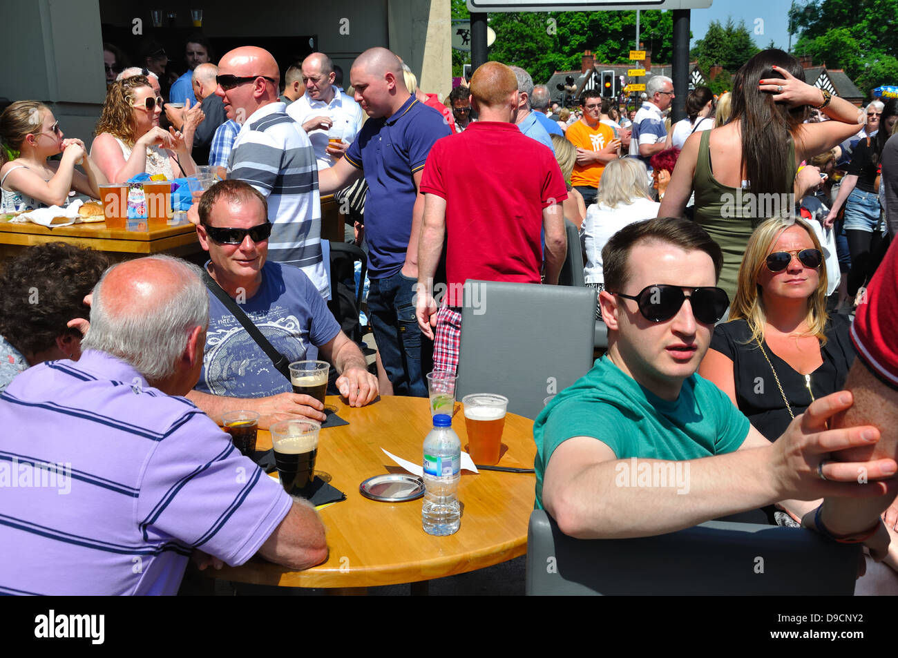 People socialising on a summers day in Glasgow, Scotland, UK Stock Photo