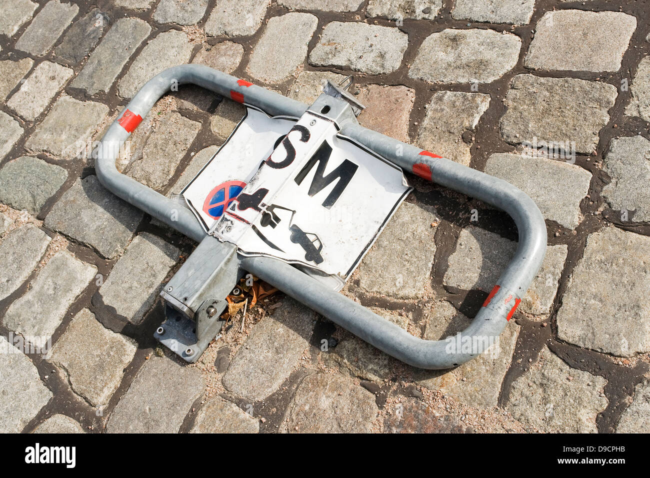 Defective barrier for a parking bay, Broken lure on a parking plumb line, Stock Photo