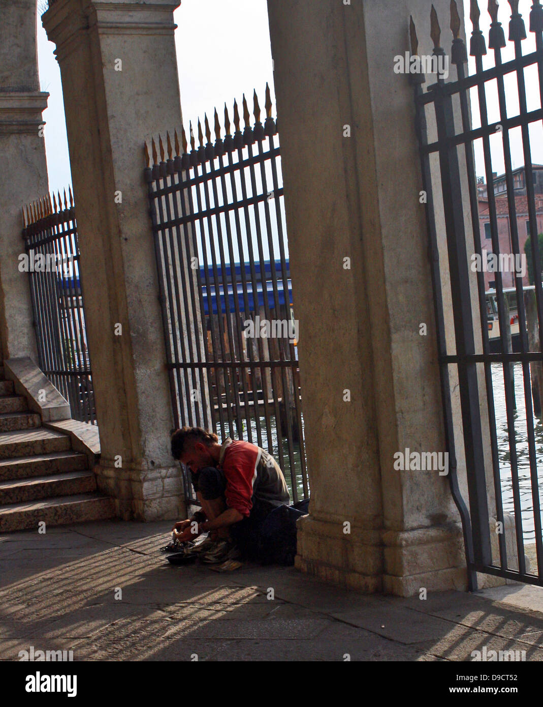 A destitute beggar on the streets of Venice, Italy during the 2008-11 Global Financial crisis. Stock Photo