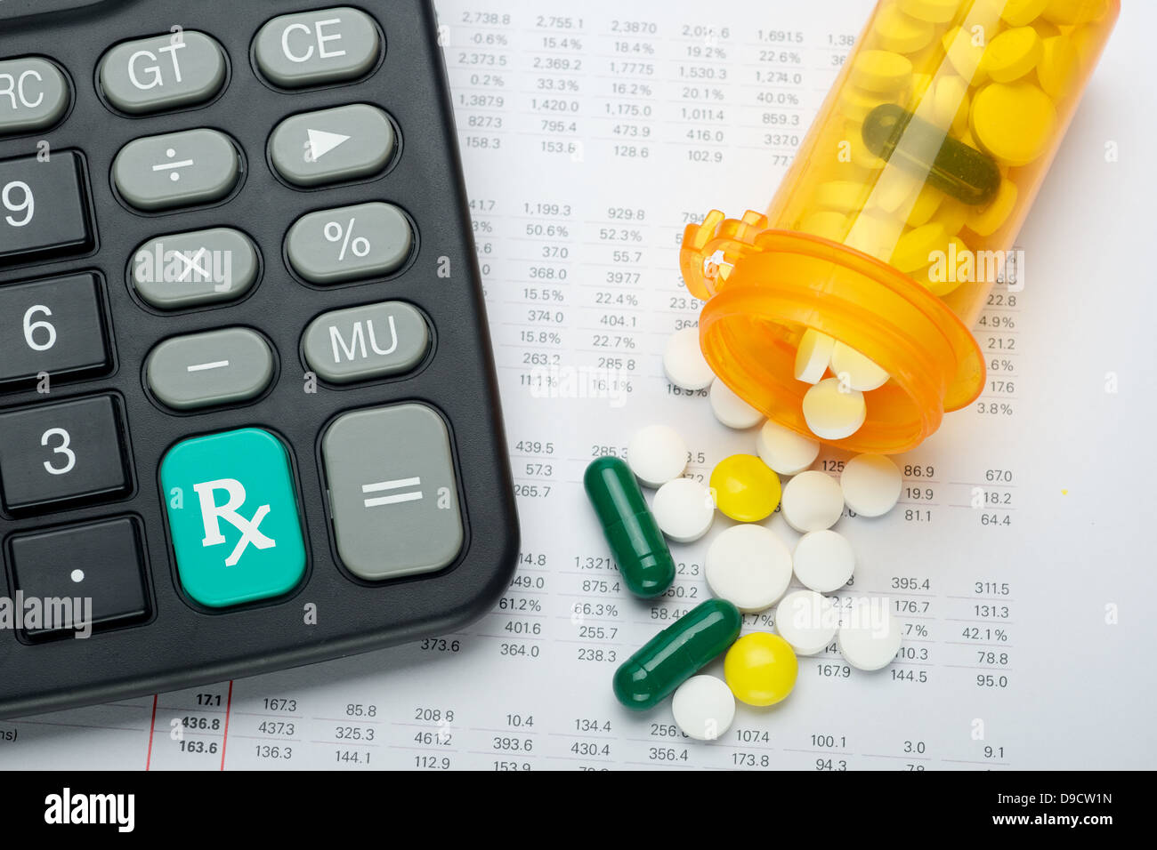 Analyzing Medical expenses with calculator Stock Photo Alamy