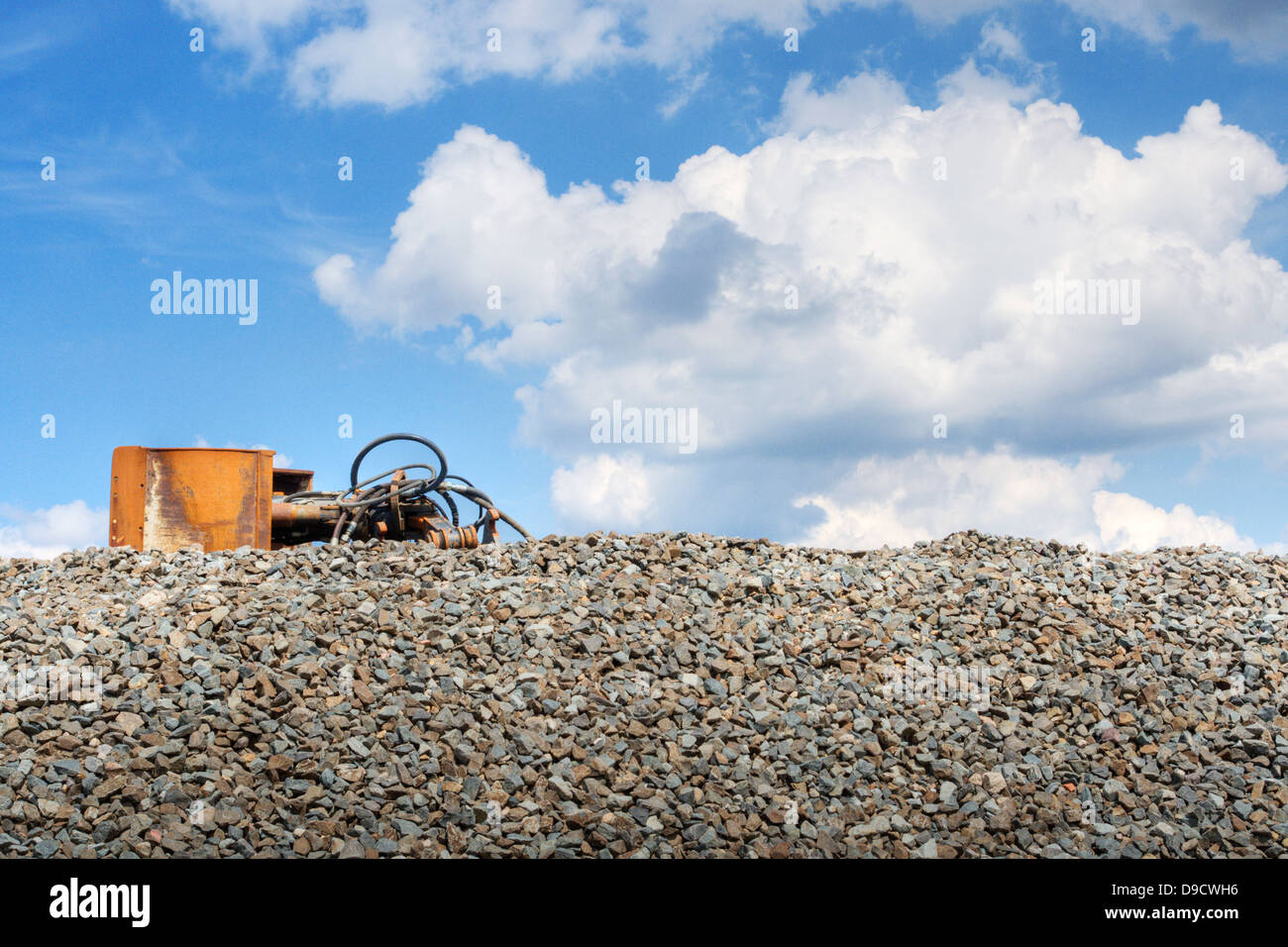 Grit heaps with excavator shovel Stock Photo