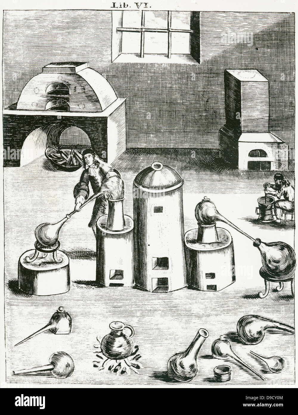 Distillation: In centre is an athanor (digesting furnace) to its right an alembic  feeds distillate into receiver.  From Magia naturalis, Nuremberg, 1715, by Johannis Baptista della Porta. First edition 1558. Stock Photo