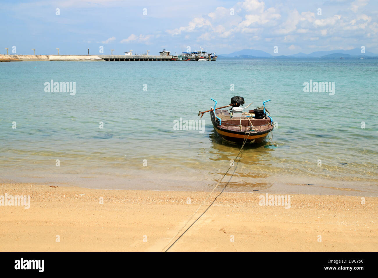 old wooden fishing boat landing on the beach Stock Photo - Alamy