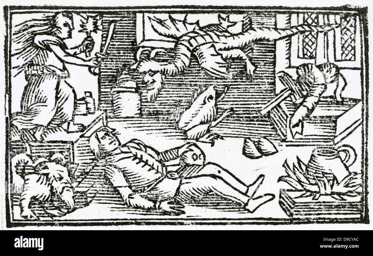 Witch, holding candle made of human fat and an artame or magic knife, summons up a demon in the form of a winged dragon.  From Historia de gentibus septentrionalibus, Antwerp, 1562, by Olaus Magnus. Stock Photo