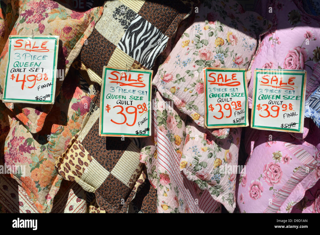 Quilts for sale at a fabric store in Jackson Heights, an Indian ...