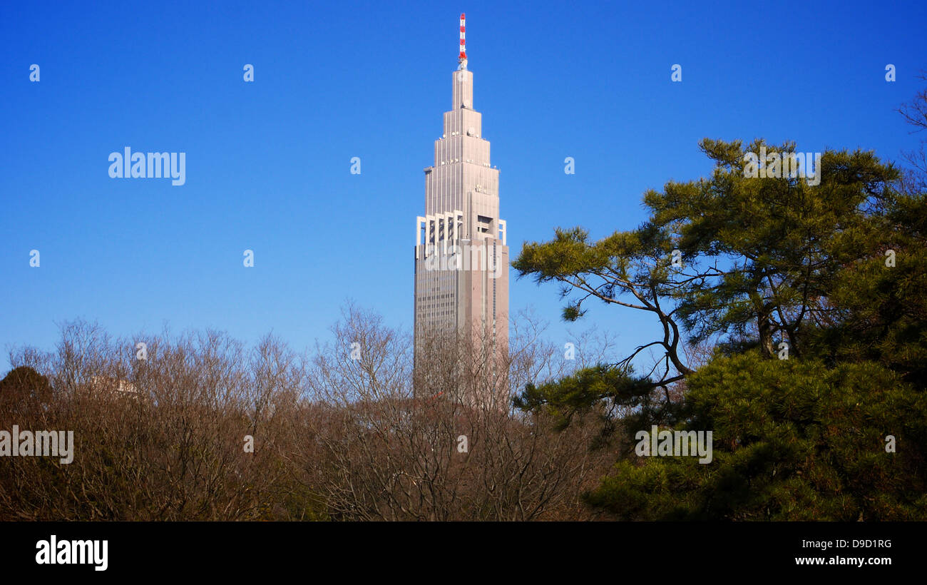 NTT Docomo Yoyogi Building as seen from Meiji Shrine Inner Garden Stock Photo