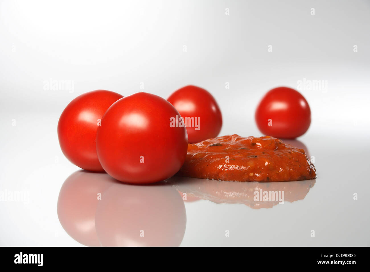 Tomatoes and tomato sauce Stock Photo