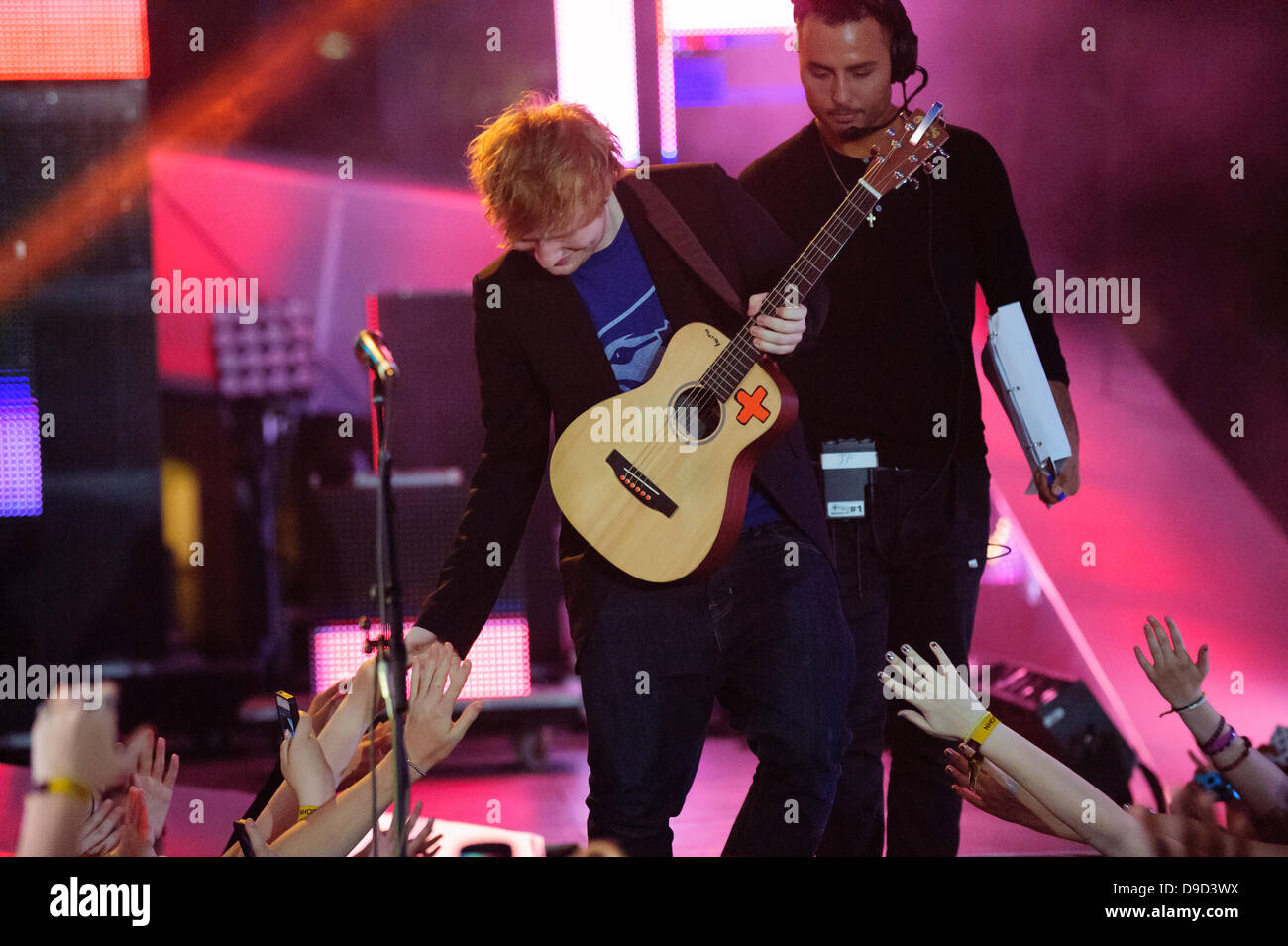 Tornoto, Canada. 16th Jun 2013. Ed Sheeran performs at the 2013 MMVA in Toronto Canada. The MuchMusic Video Awards took over the trendy Queen West village in Toronto for an award show featuring PSY and other super stars including Avril Lavigne, Demi Lovato, Serena Ryder, Ed Sheeran, Marianas Trench, Classified, and Armin Van Buuren with Trevor Guthrie. Credit:  Victor Biro/Alamy Live News Stock Photo