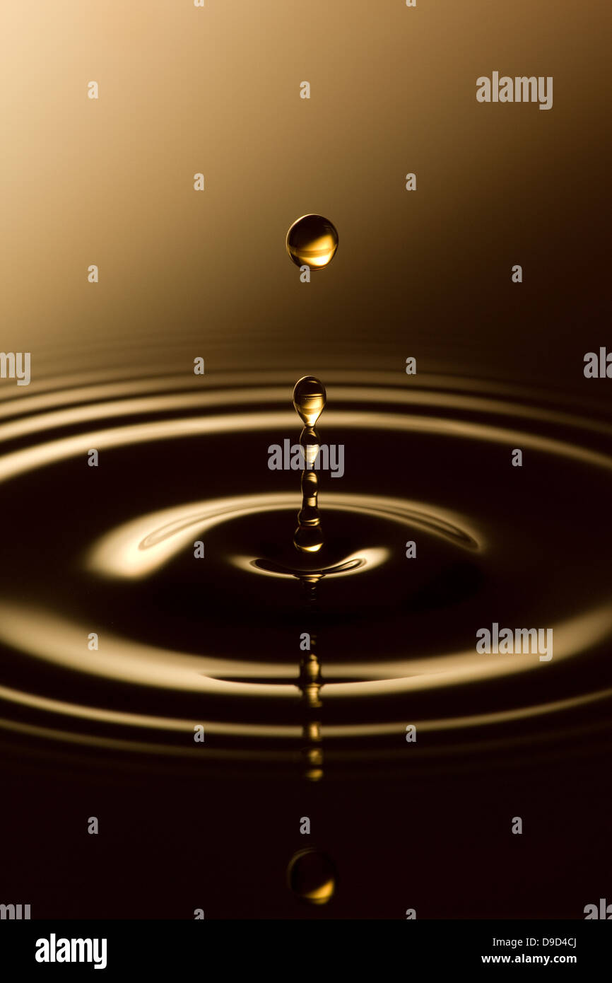 Ripples in coffee Stock Photo - Alamy