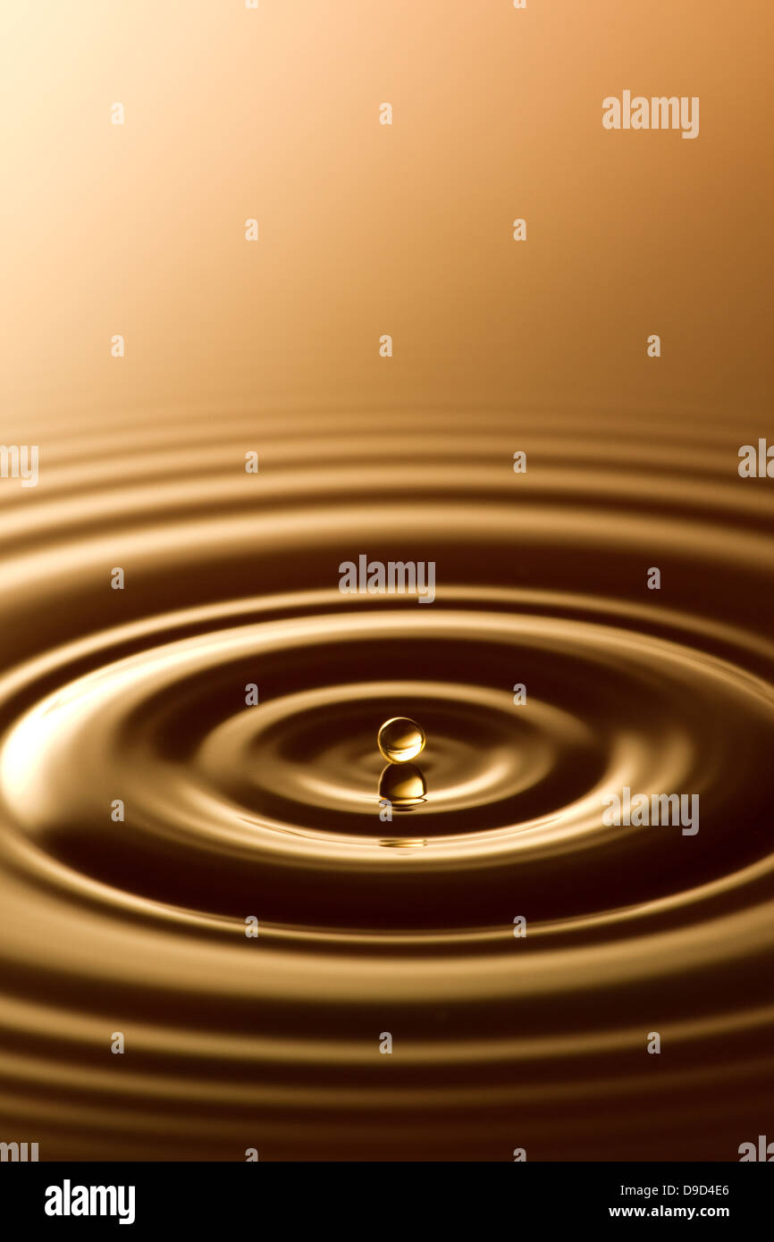 Ripples in coffee Stock Photo - Alamy