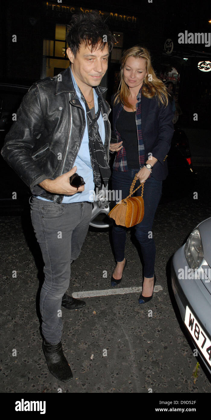 Jamie Hince and Kate Moss outside The Hospital Club where Hince's band 'The Kills' performed tracks from their new album 'Blood Pressures' London, England - 24.03.11 Stock Photo