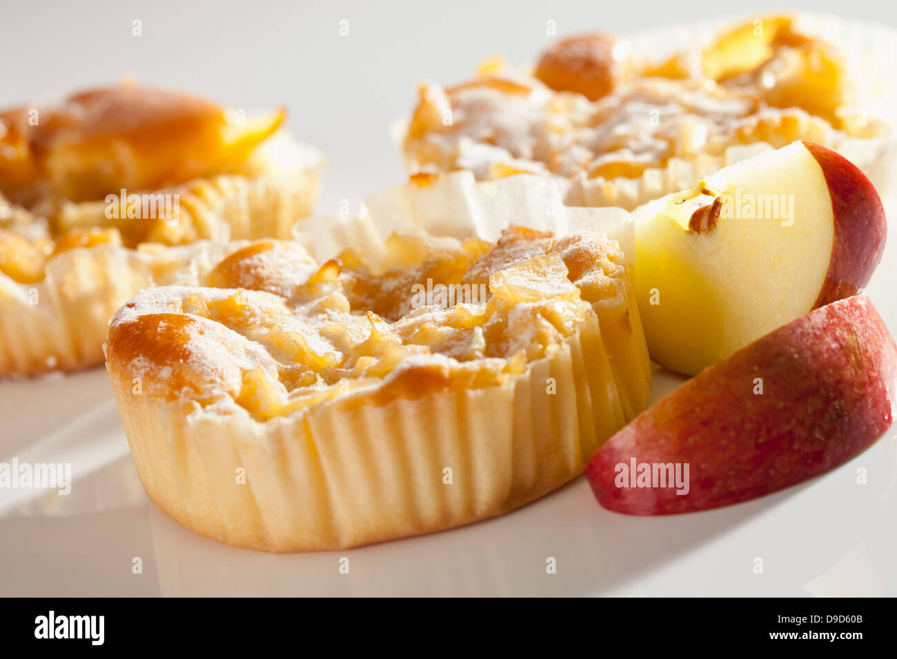 Apple tartlets on white background, close up Stock Photo