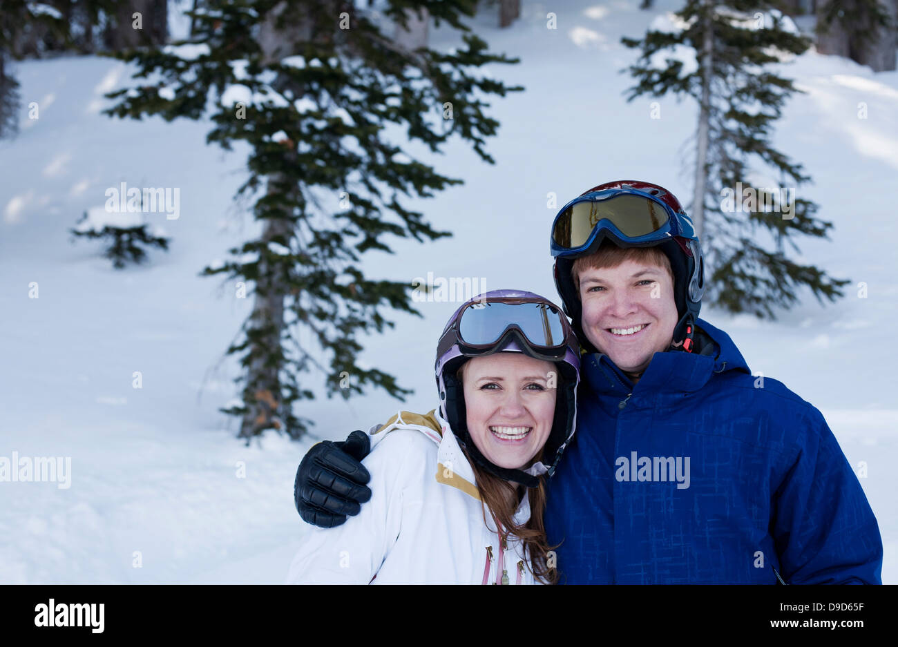 Young couple wearing skiwear Stock Photo