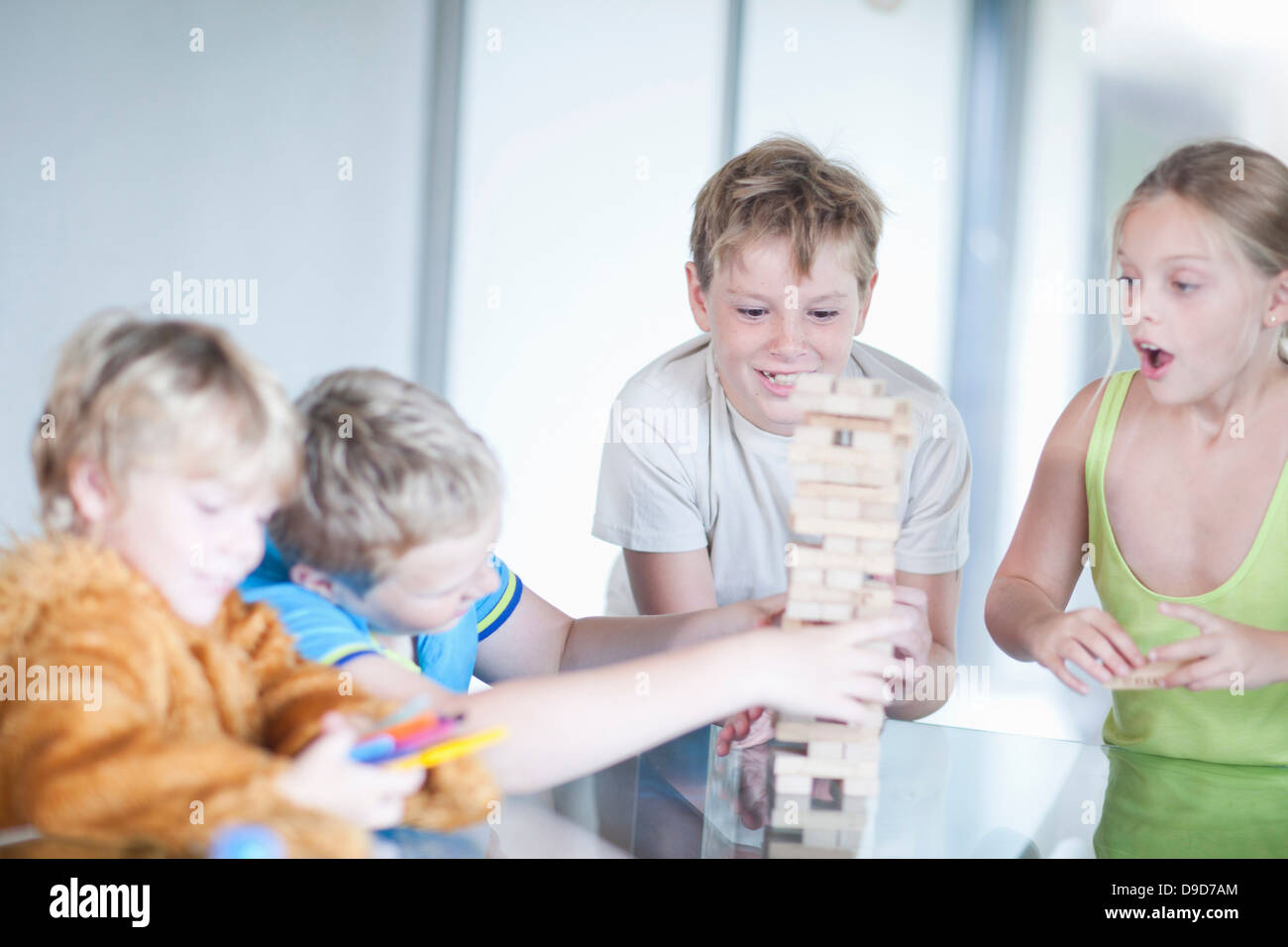 Children playing wood blocks Stock Photo
