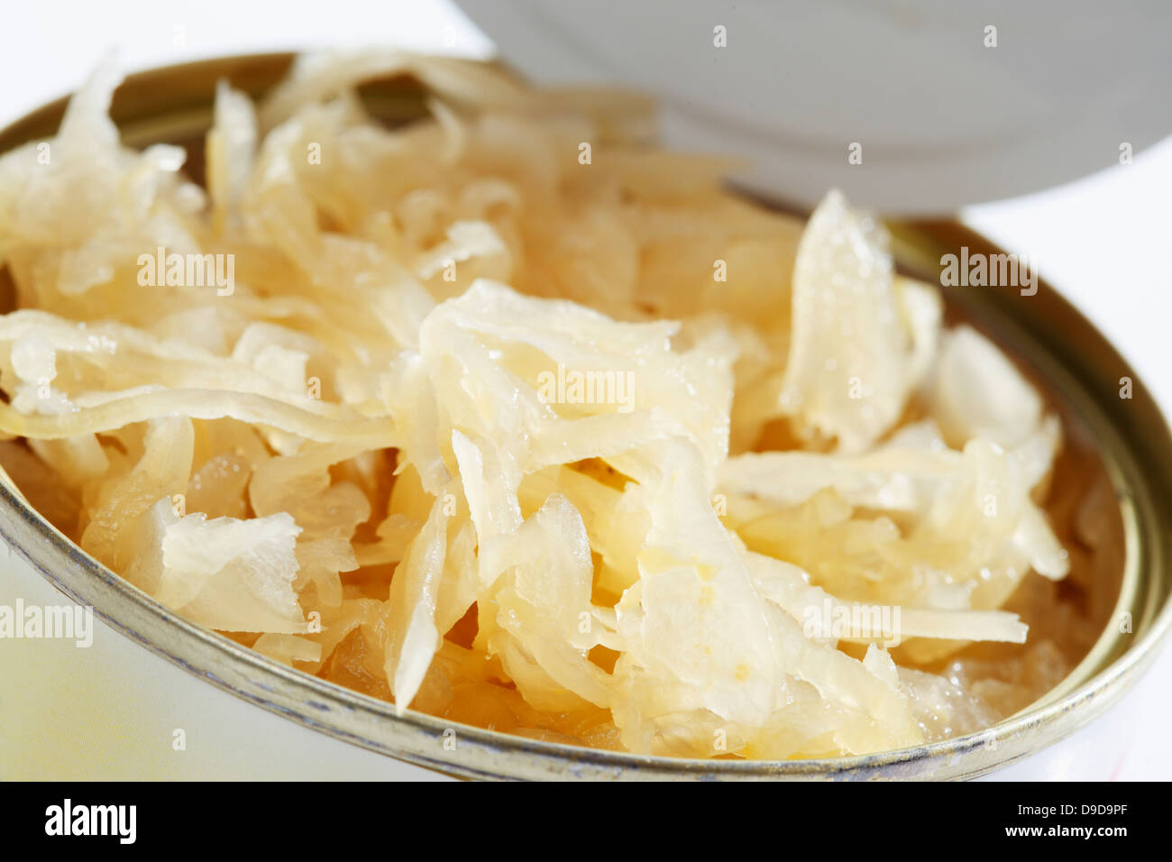 Sauerkraut in opened tin, close up Stock Photo Alamy