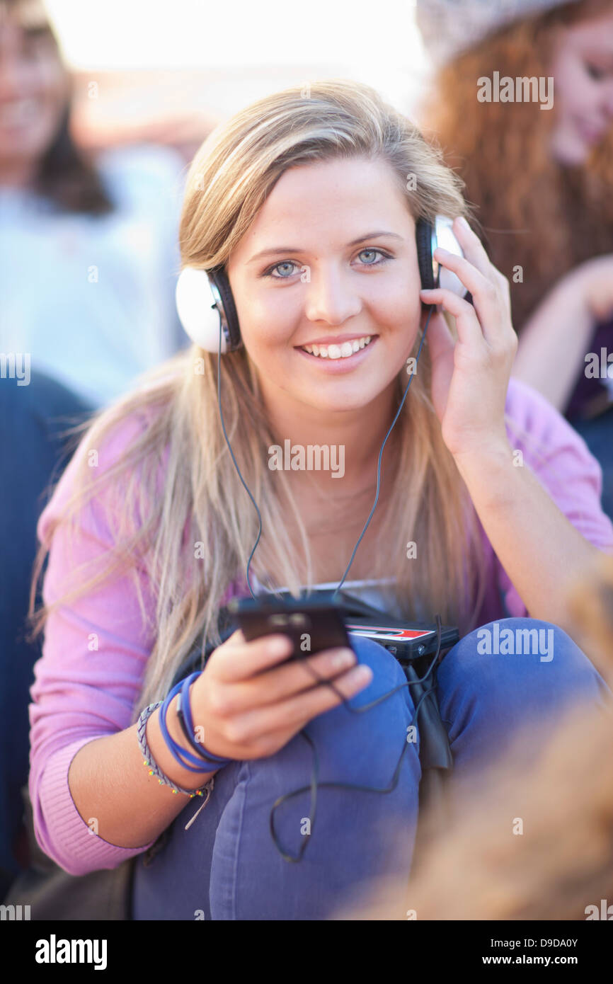Young woman wearing headphones Stock Photo Alamy