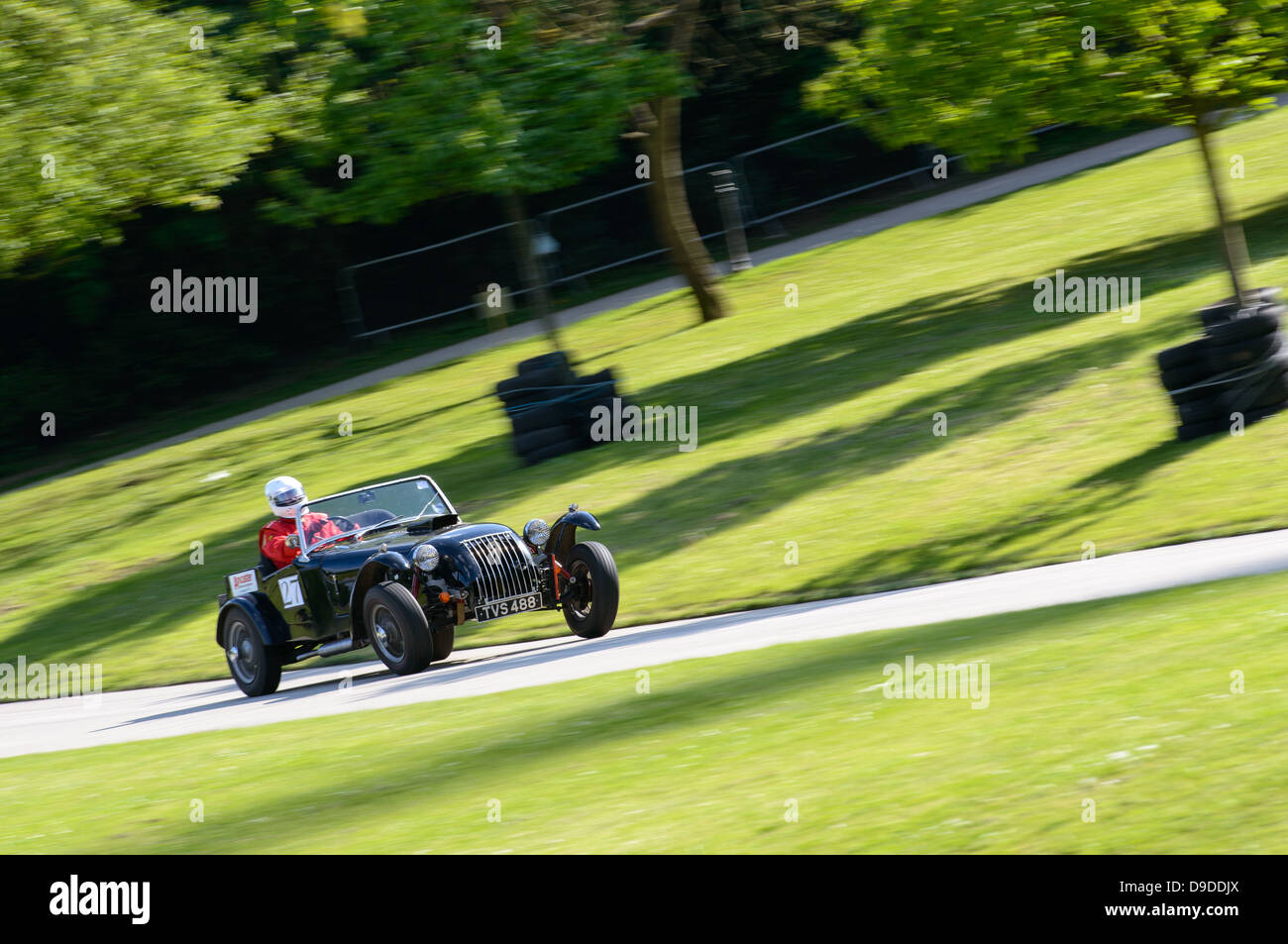 A car racing around Crystal Palace Park in London for the Motorsport at the Palace Sprint 2013. Stock Photo