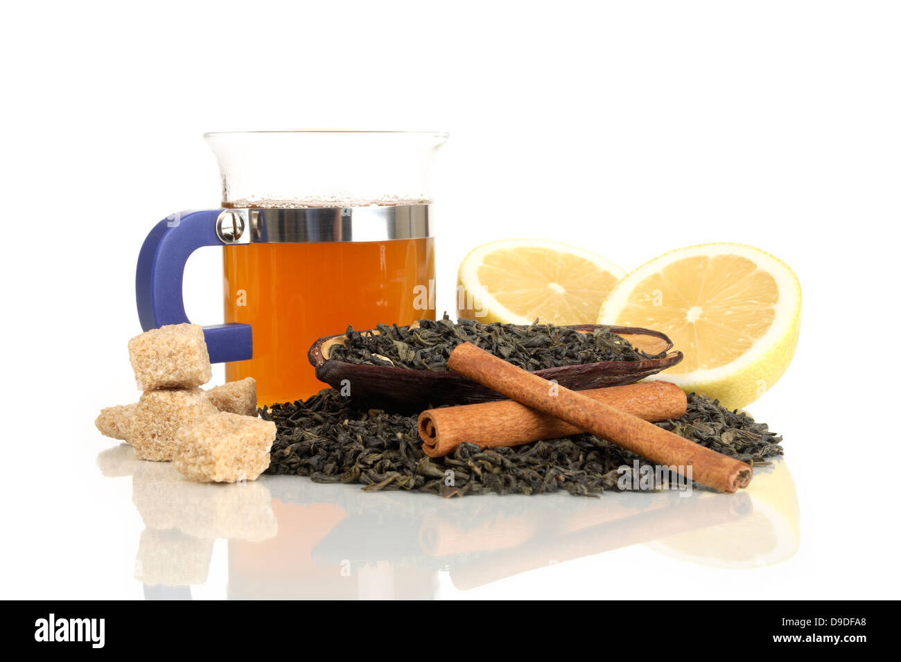 Lemon tea with cinnamon sticks Stock Photo