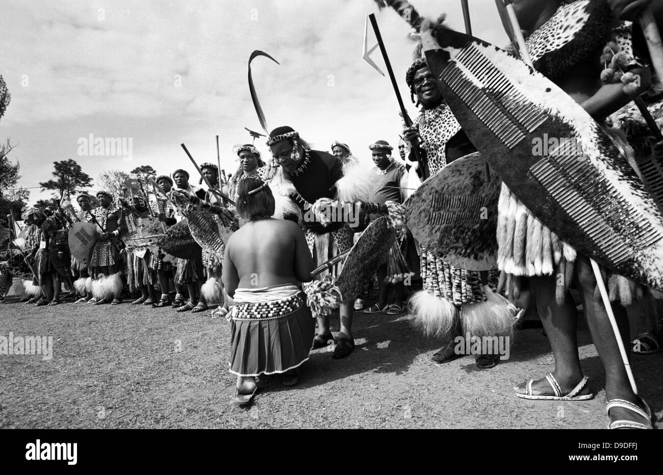 A young Zulu maiden speaks to Zulu King King Goodwill Zwelithini during traditional dance after speeches on Shaka Day Sound Stock Photo