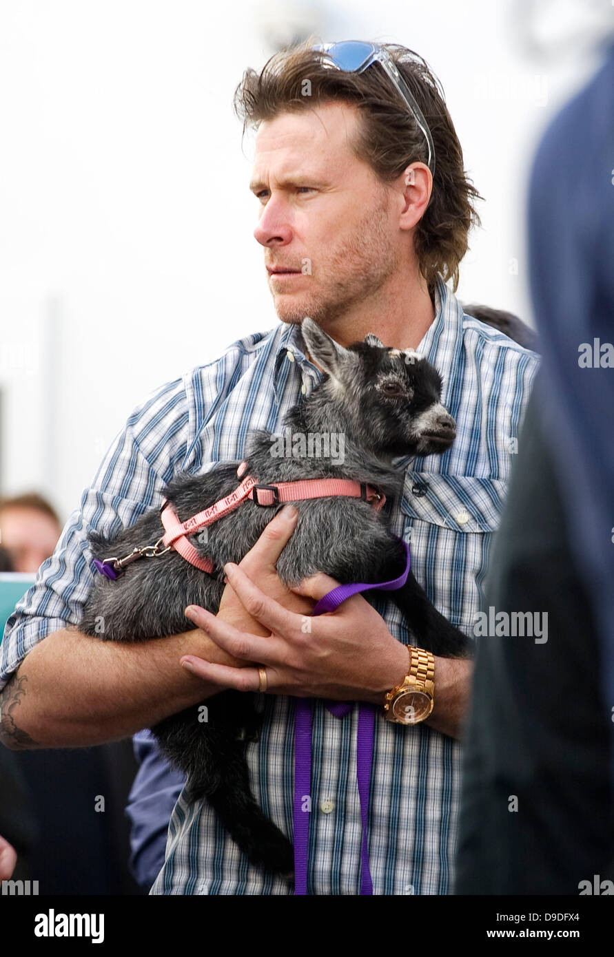 Dean Mcdermott holds Juliet the Goat Dean Mcdermott and Tori Spelling