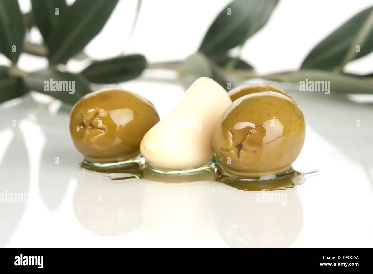 Olives with garlic Stock Photo Alamy