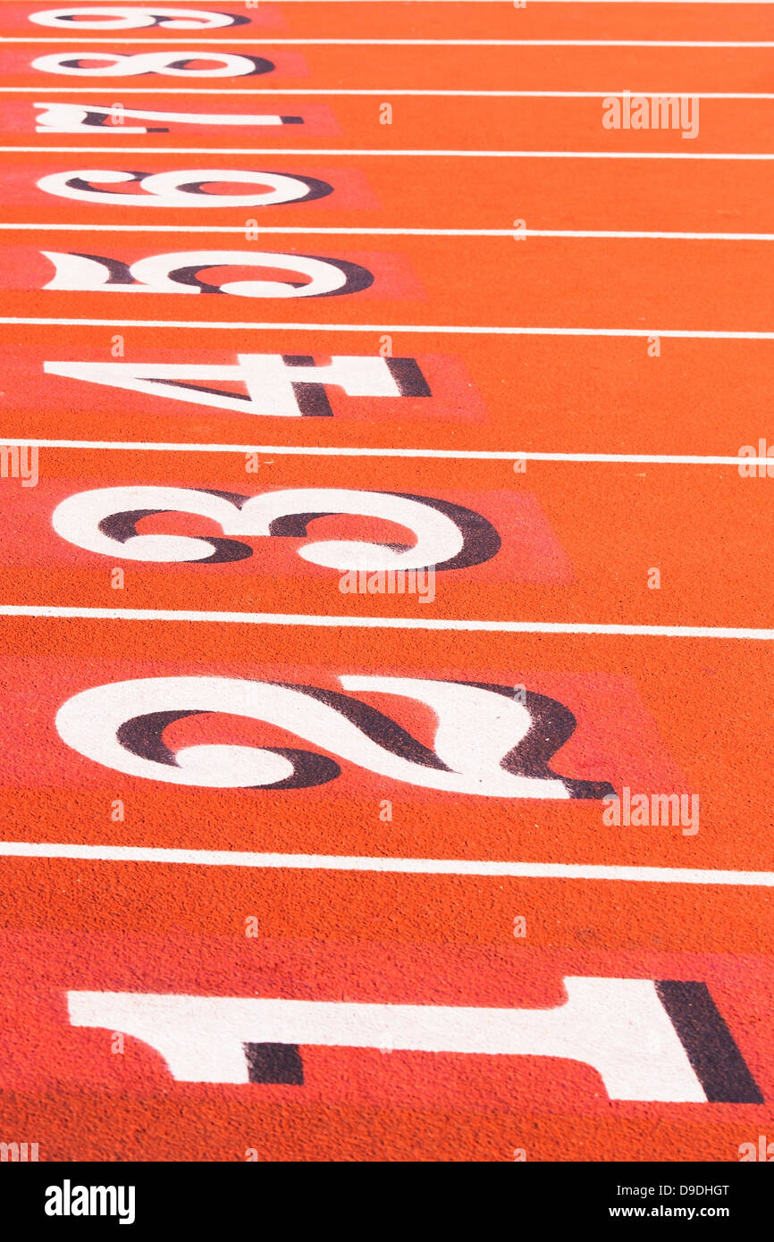 Numbers on running track in sportsground Stock Photo Alamy