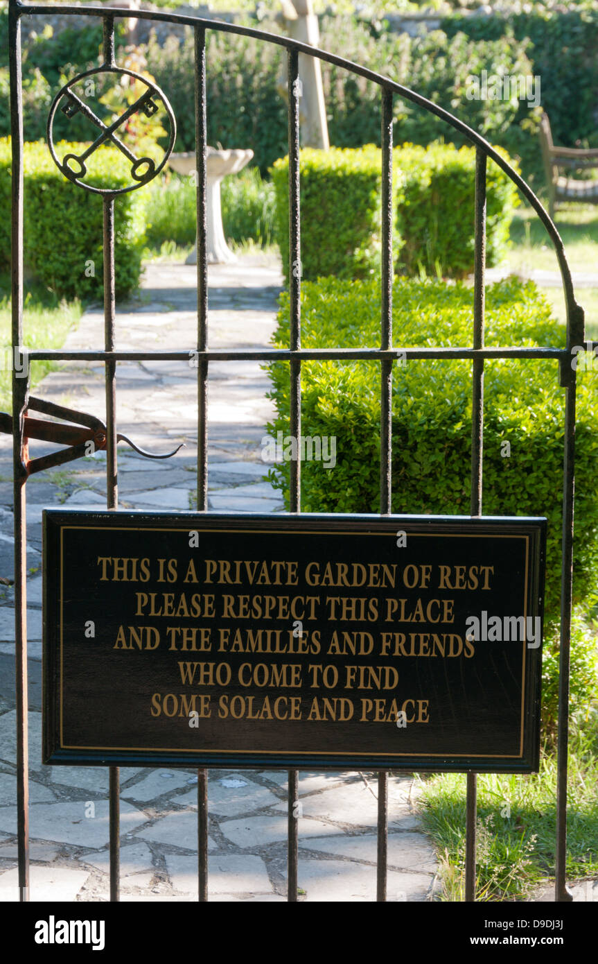 Gated entrance to a Garden of Rest in a Kent churchyard. Stock Photo