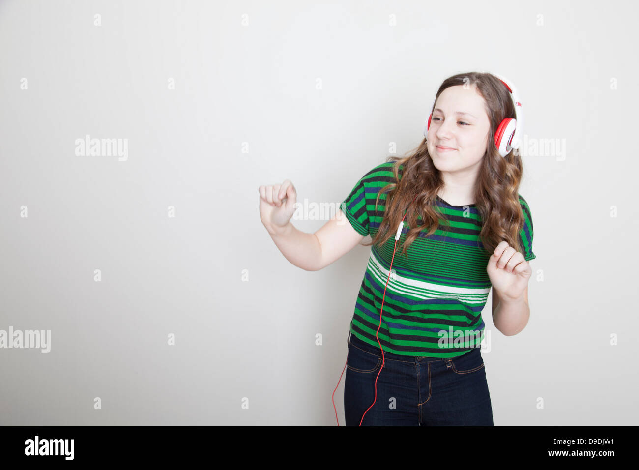 Girl dancing wearing headphones Stock Photo