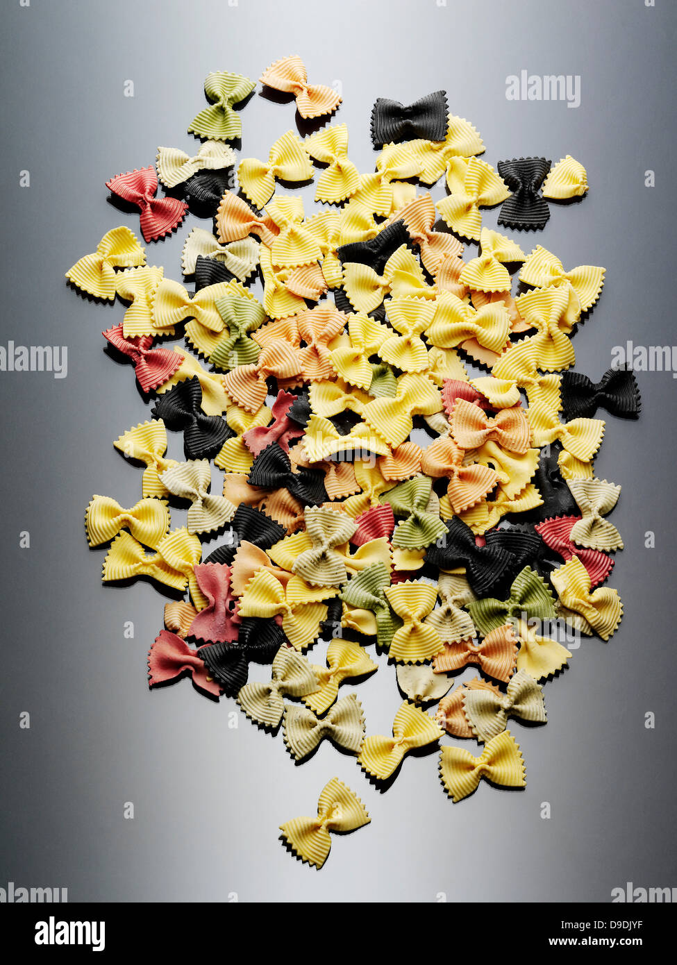 Colorful still life of dried farfalle pasta Stock Photo