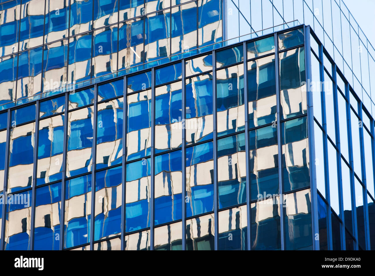 Close up of skyscraper with glass facades Stock Photo