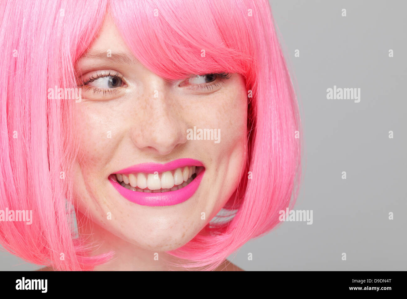 Close up of teenage girl with pink hair Stock Photo