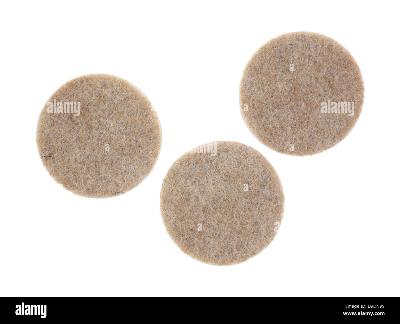 Three felt surface protectors on a white background. Stock Photo