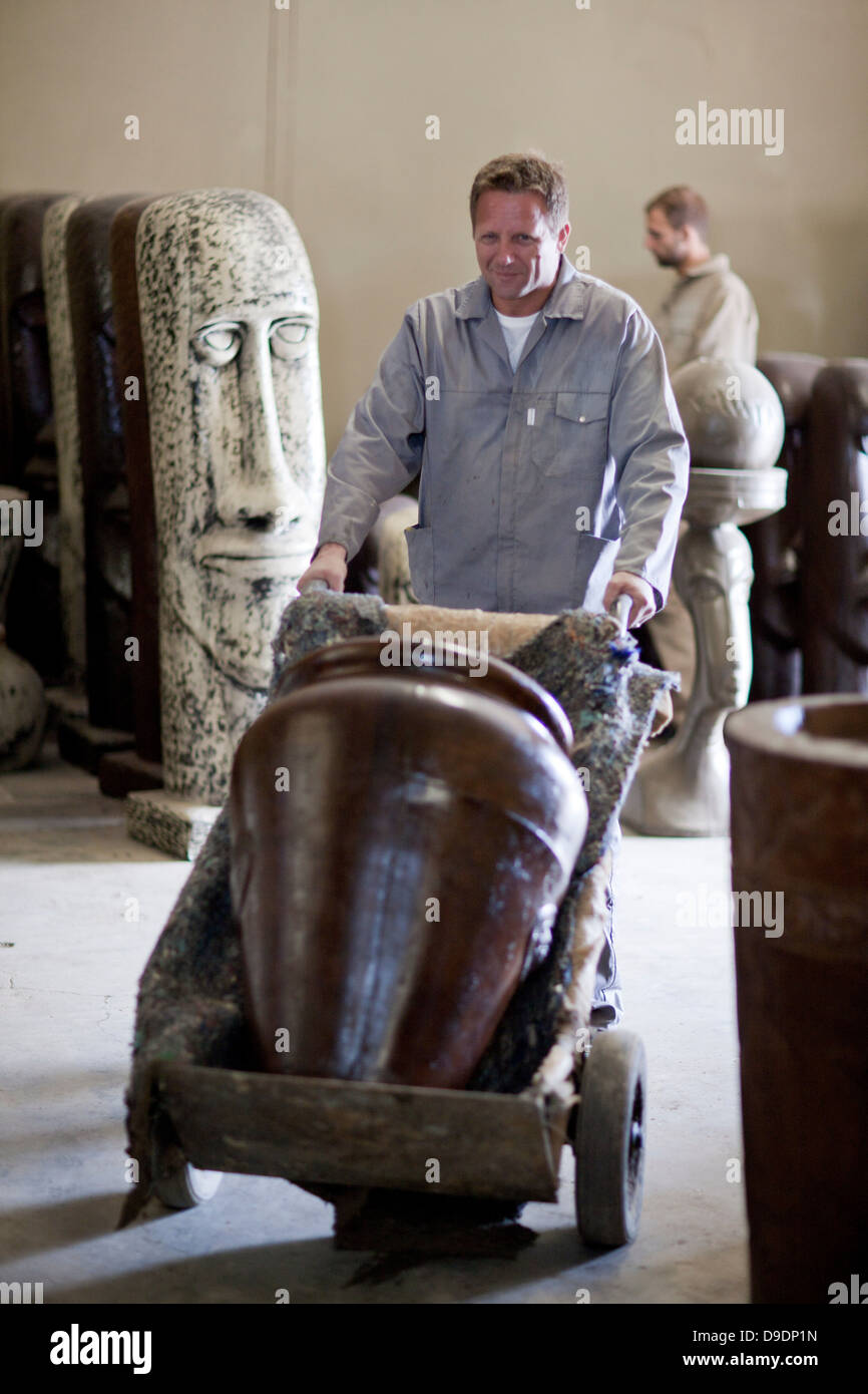 Delivering vase in pottery factory Stock Photo Alamy