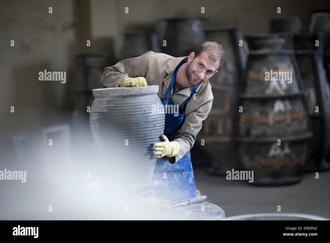 Sculpting and shaping pottery Stock Photo Alamy