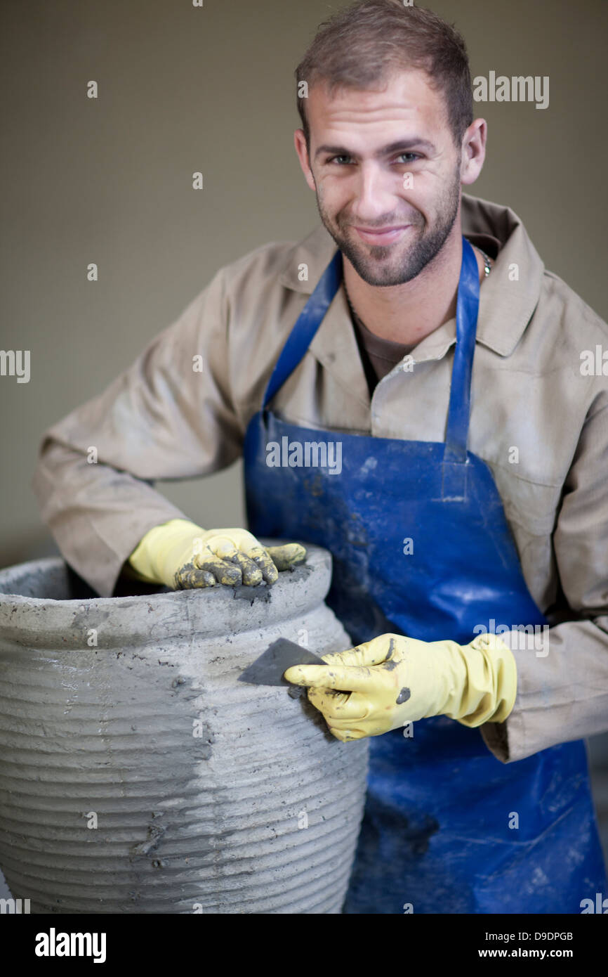 Sculpting and shaping pottery Stock Photo Alamy