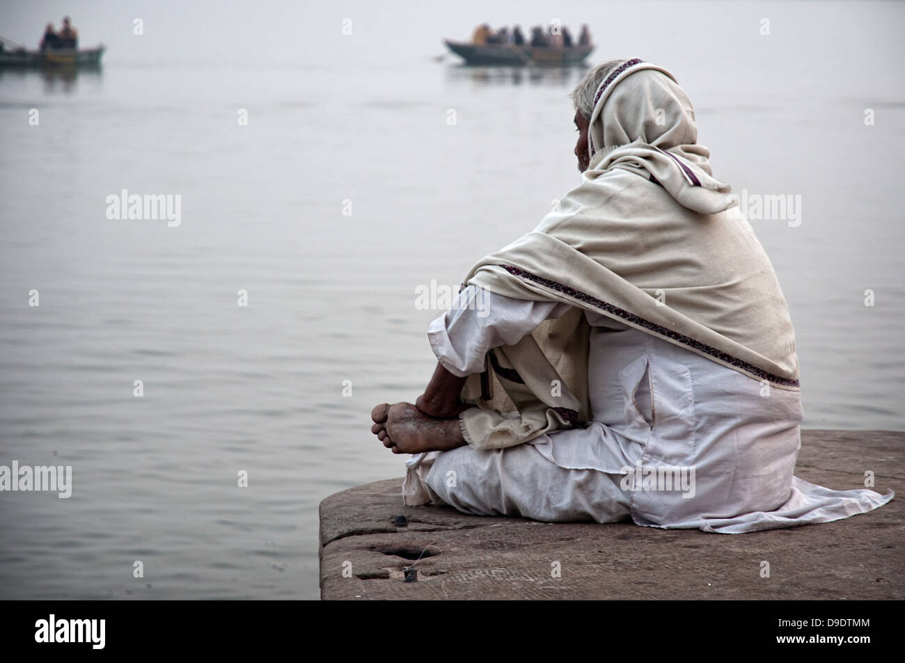 Indian man sitting on boat varanasi hi-res stock photography and images ...