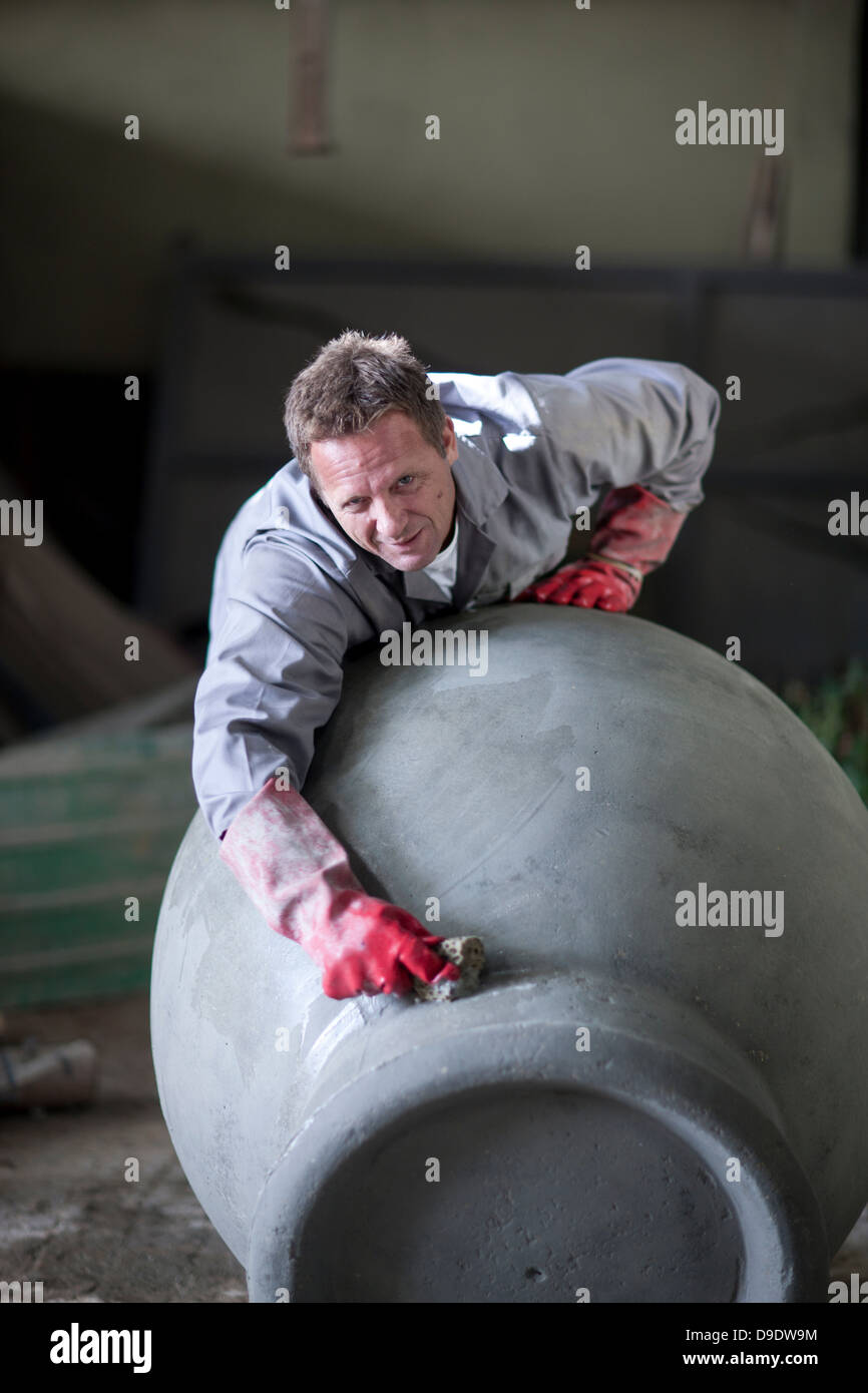 Sculpting and shaping pottery Stock Photo Alamy